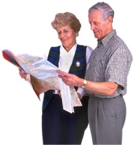 man and woman reading map