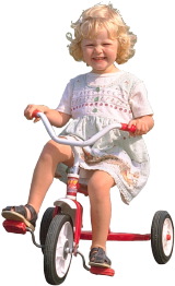 small girl on tricycle
